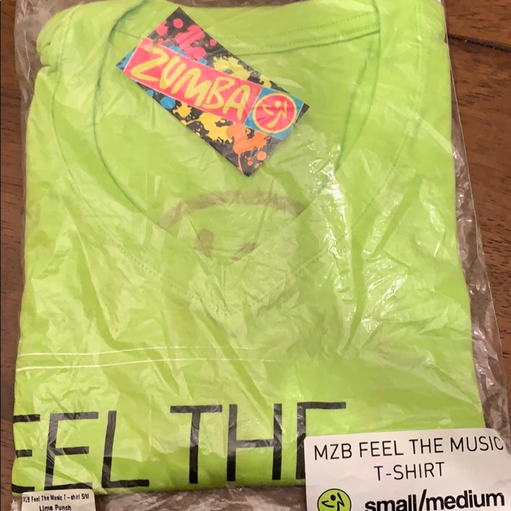 Brand new Zumba Feel the Music neck tee